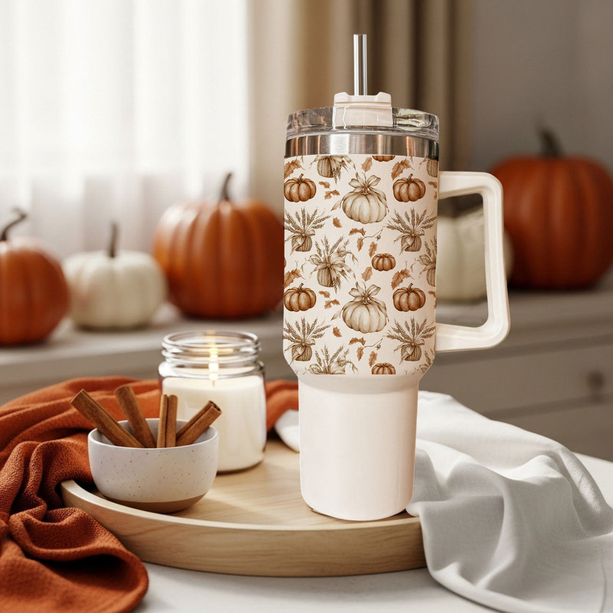 40oz insulated tumbler with handle, clear lid, and straw; cream pumpkin and leaf pattern.