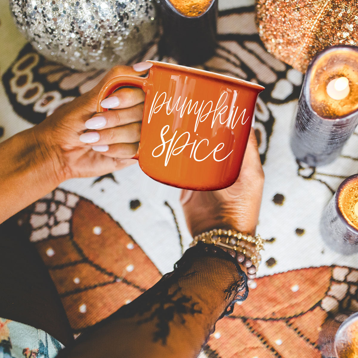 Orange mug with handle, Pumpkin Spice script visible on front