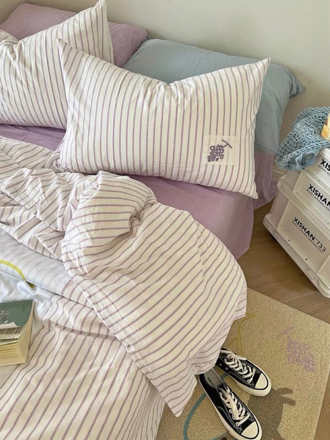 Duvet cover set with striped duvet and pillow covers in lilac and white