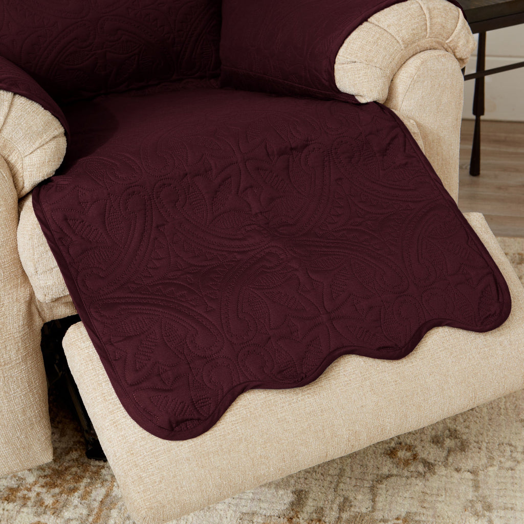 Burgundy recliner protector draped over beige seat and arm with medallion texture