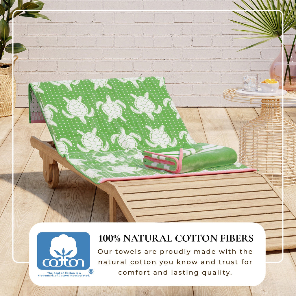 Green cotton velour beach towel with white sea turtle pattern