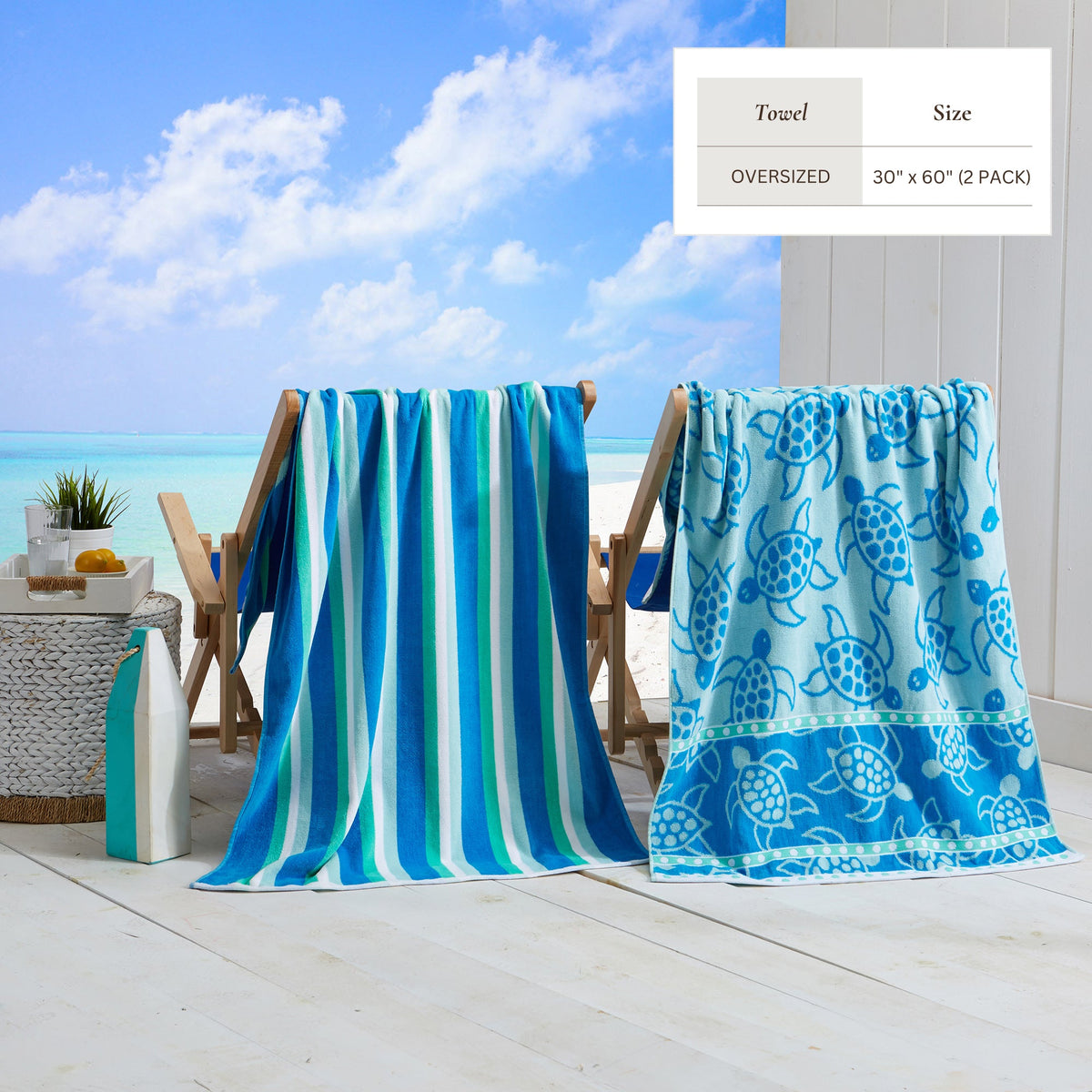 Blue cotton velour towels on chairs, one striped and one with shell motif