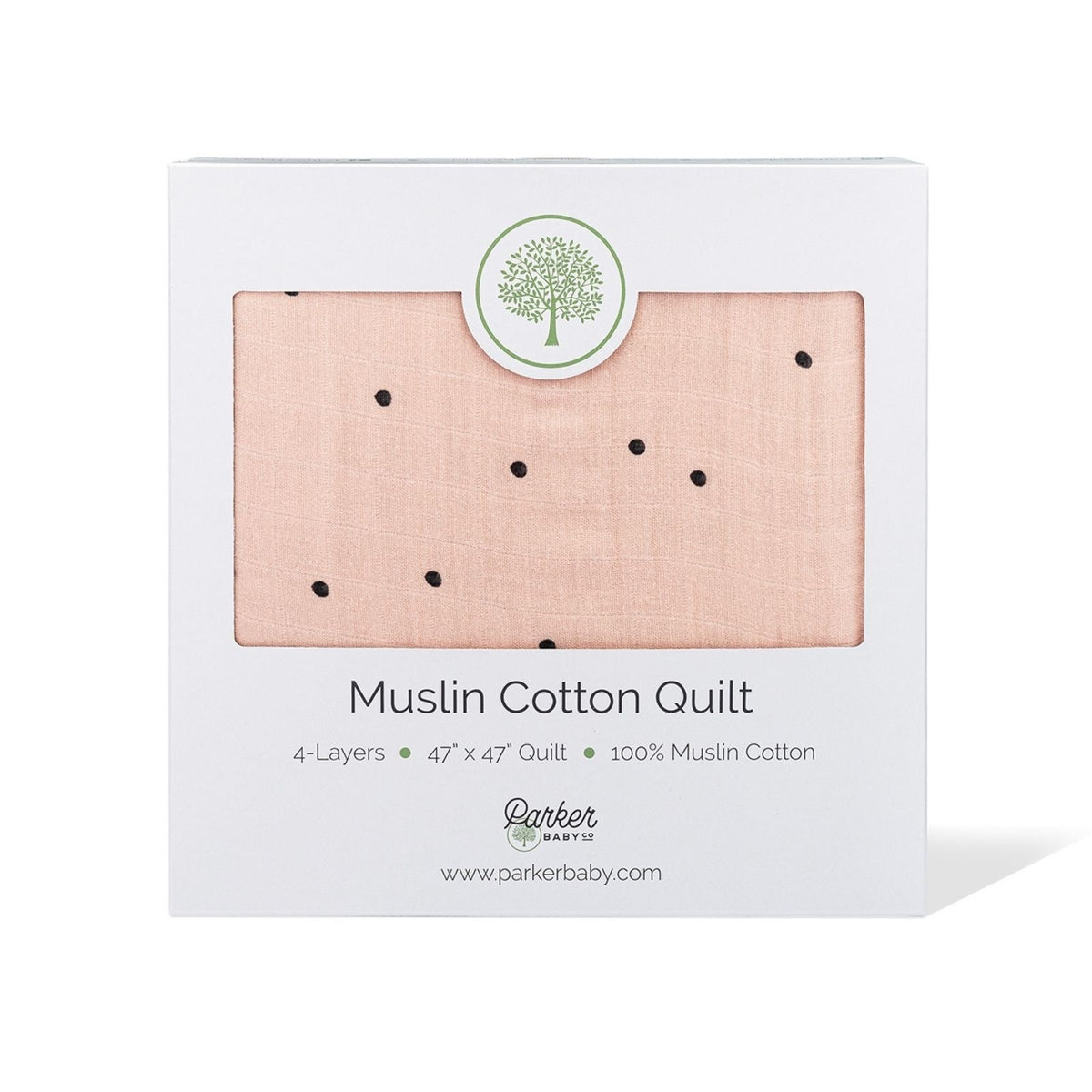 Blush muslin cotton quilt shown in retail box with dot print