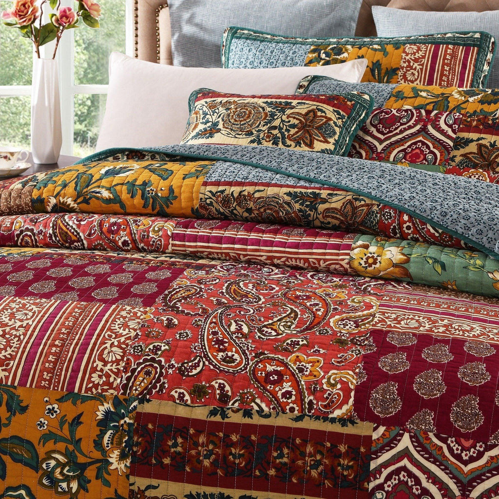 Bohemian floral cotton patchwork bedspread with red, green, and yellow paisley stripes