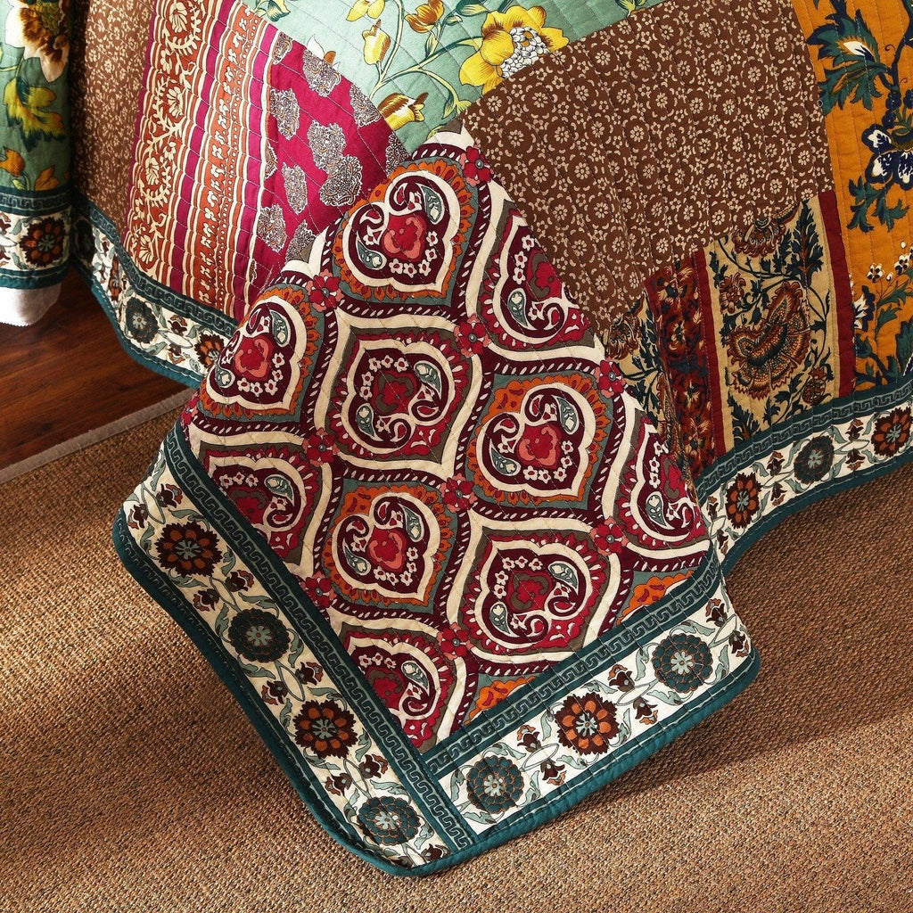 Bohemian paisley cotton patchwork bedspread with red medallion motifs and teal trim