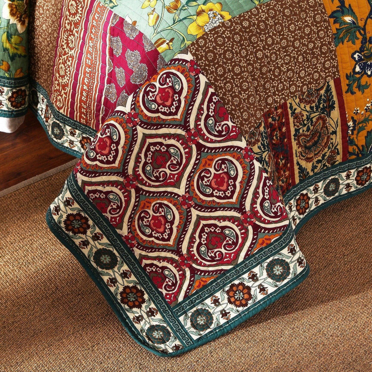 Bohemian paisley cotton patchwork bedspread with red medallion motifs and teal trim
