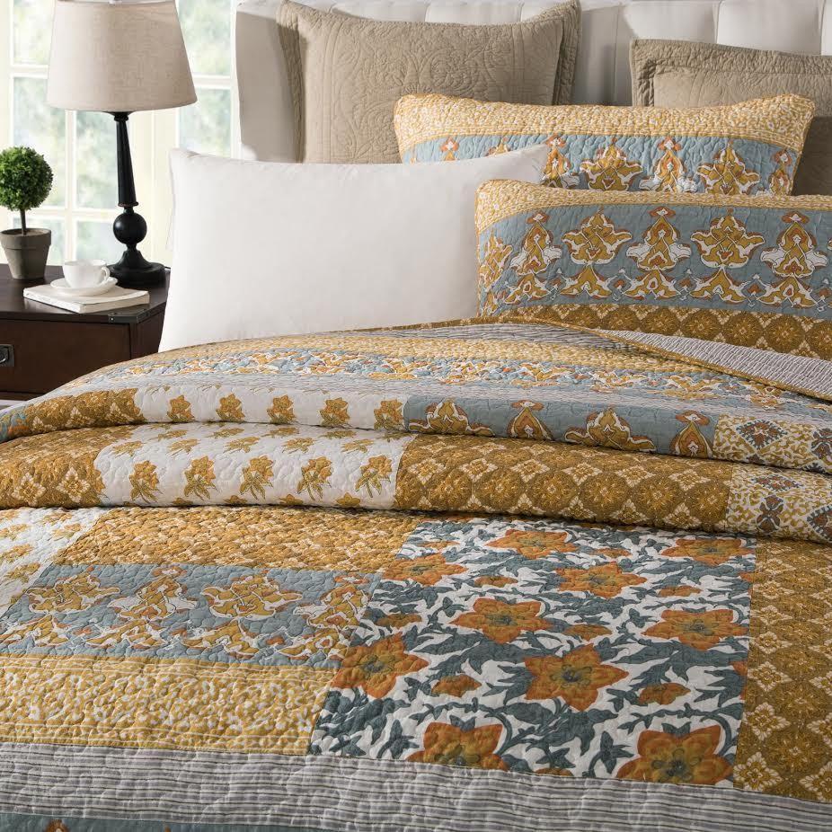 Cotton quilt bedspread set featuring blue and gold medallion prints with matching pillow covers