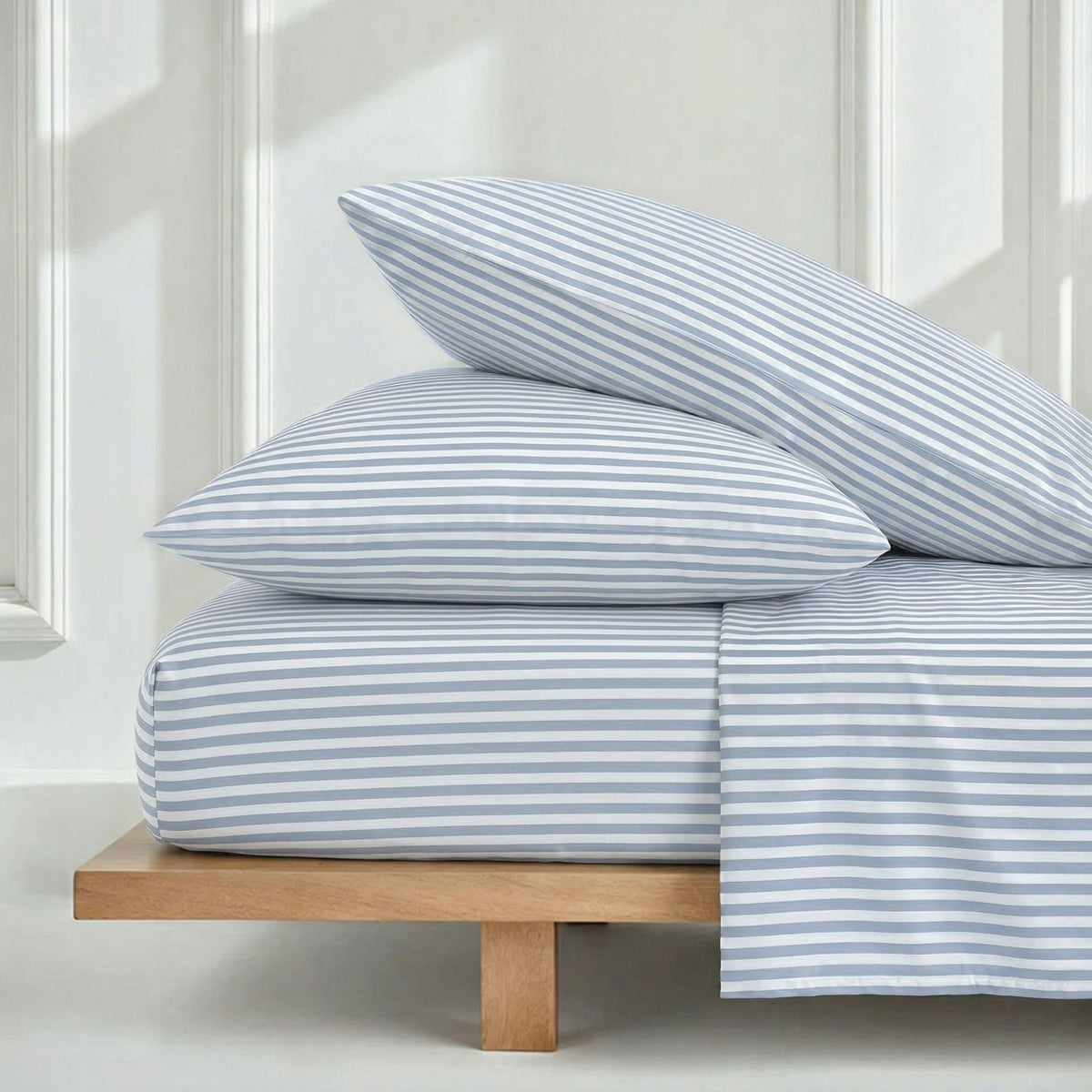 Light blue and white striped sateen sheet set with fitted sheet and pillowcases