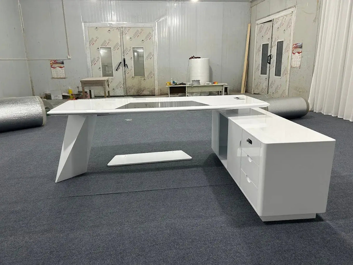 White L-shaped executive desk with drawer cabinets and open cable bay