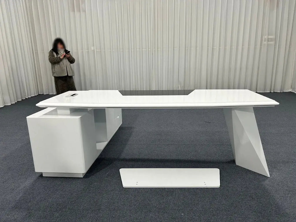 White L-shaped desk with wide tabletop and integrated drawers