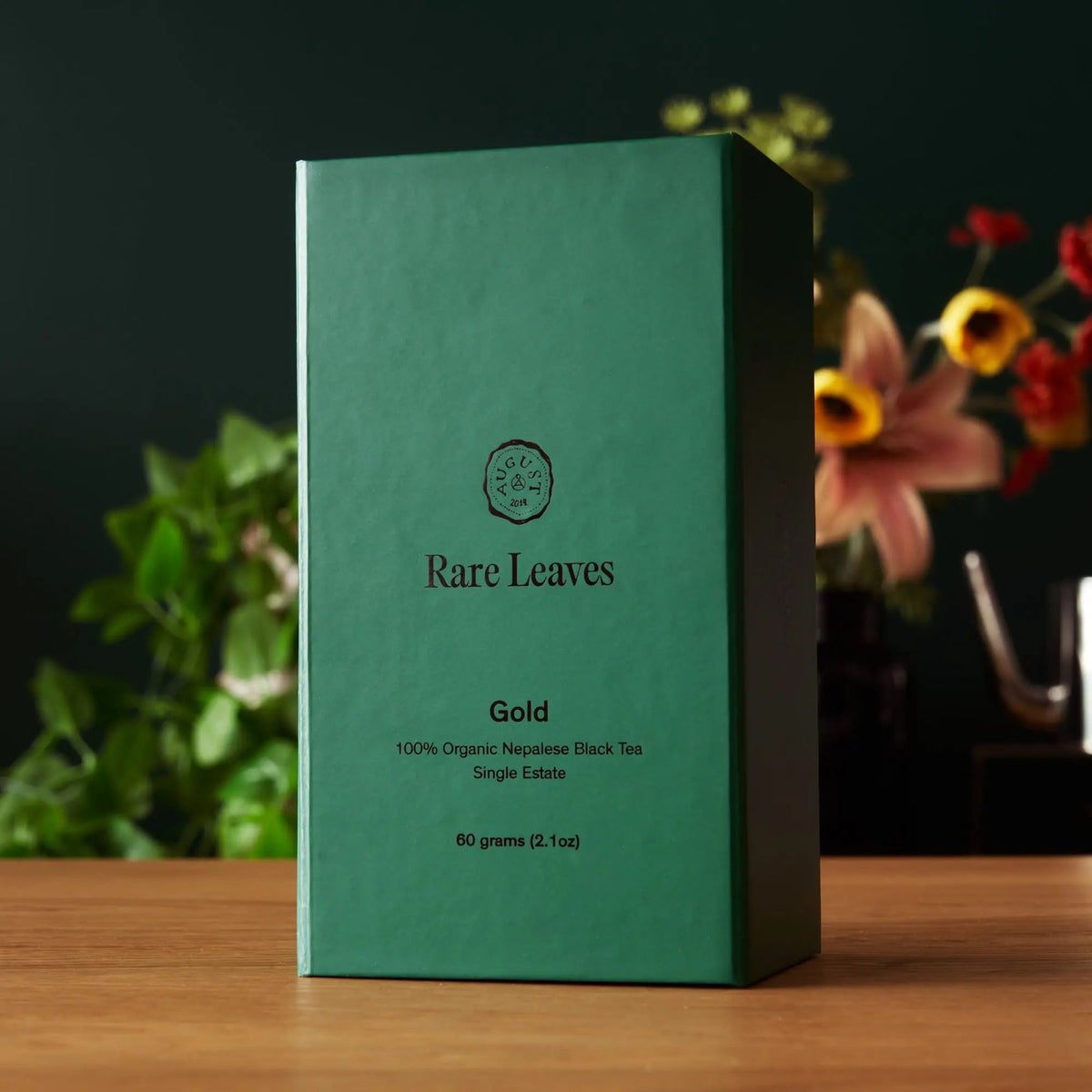 Gold tea gift box in green with Rare Leaves branding and 60 g
