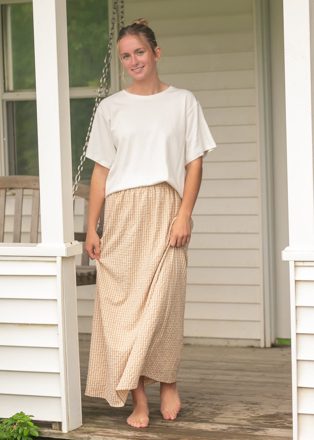 Gingham maxi skirt with gathered waist, orange-and-white check, full-length hem