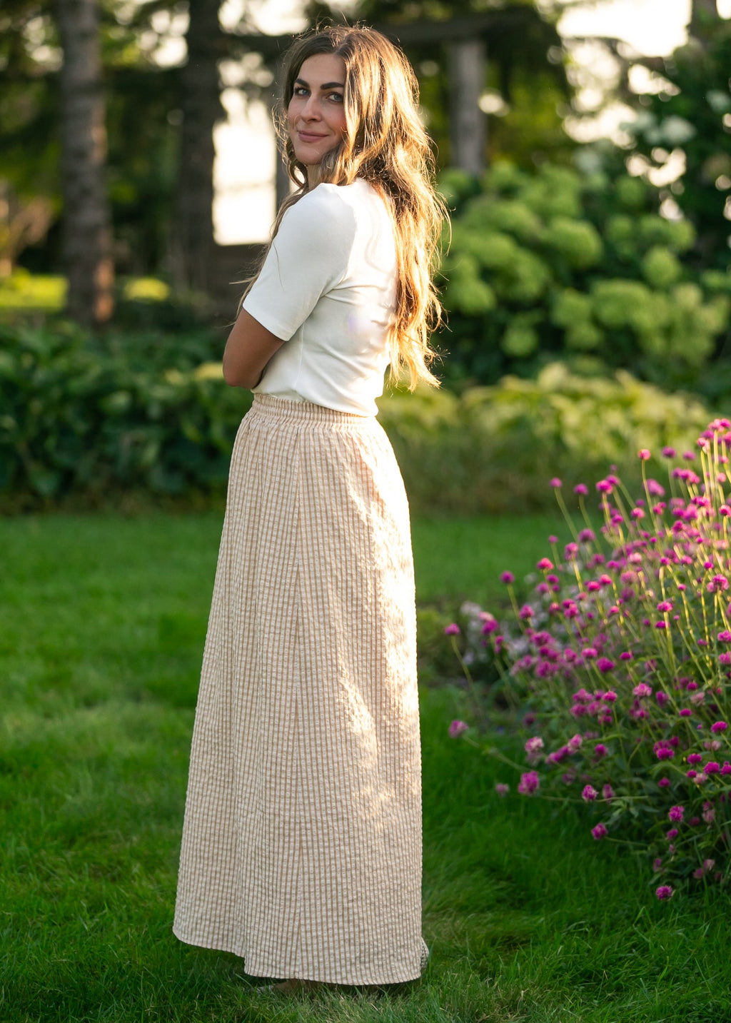 Beige and white gingham maxi skirt with elastic waist and long straight, gathered hem