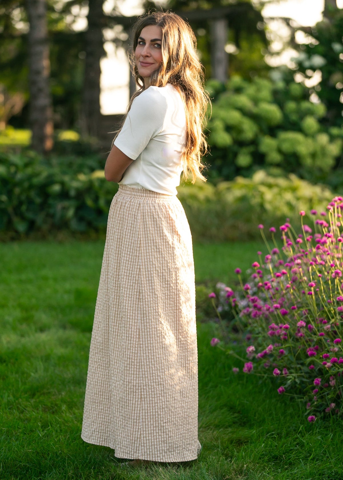 Beige and white gingham maxi skirt with elastic waist and long straight, gathered hem