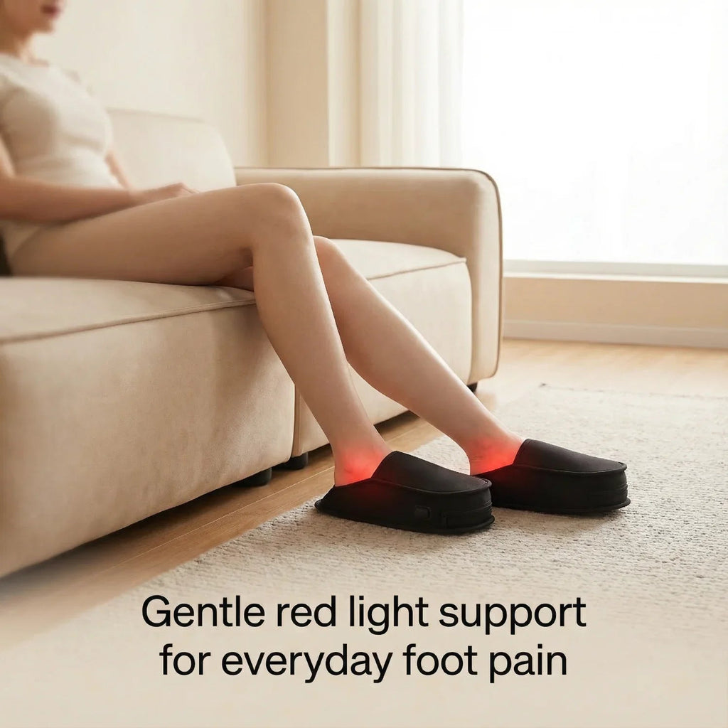 Black slippers with glowing red panels under the feet on a living room rug