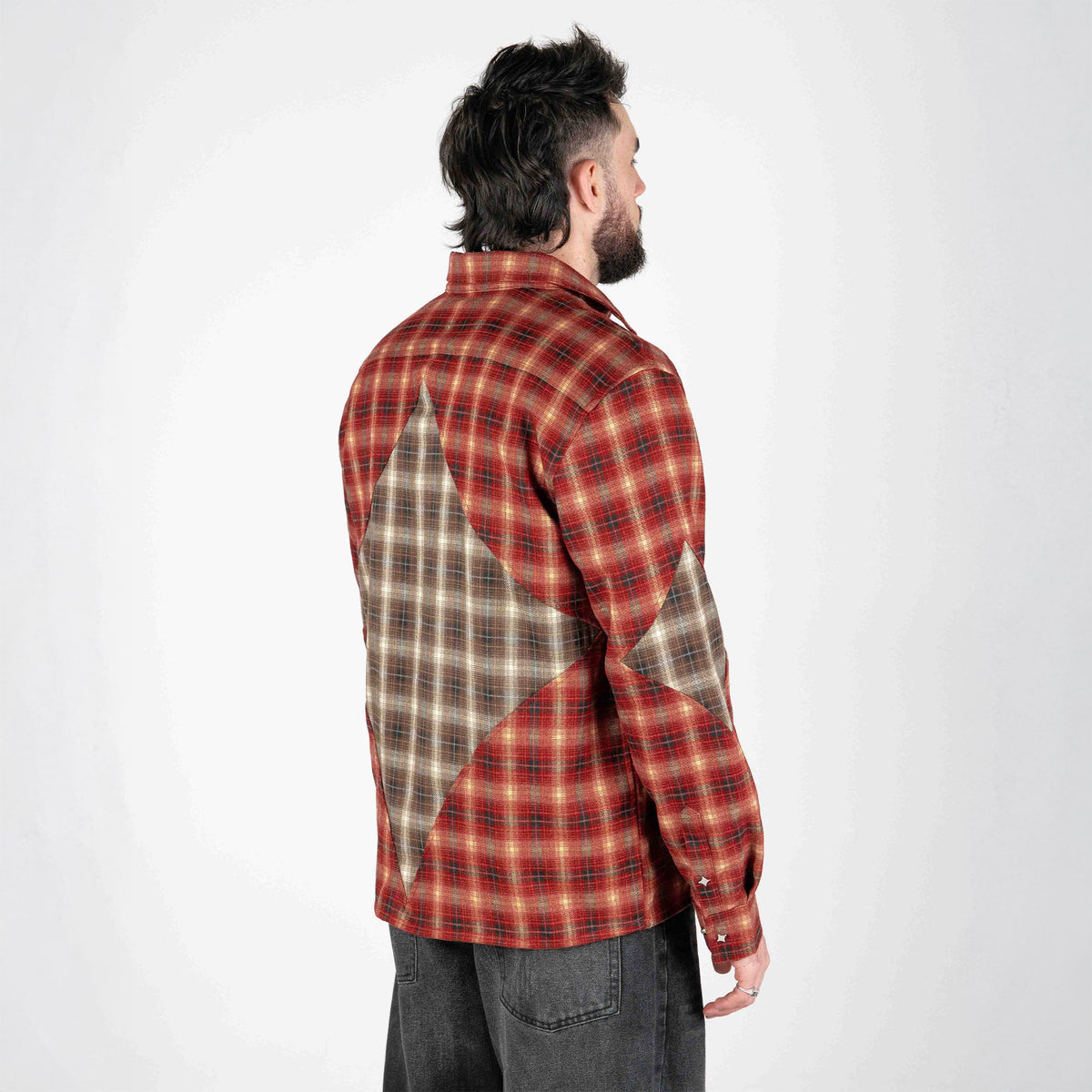 Red plaid zip-up flannel jacket back view, showing sleeve and shoulder seam