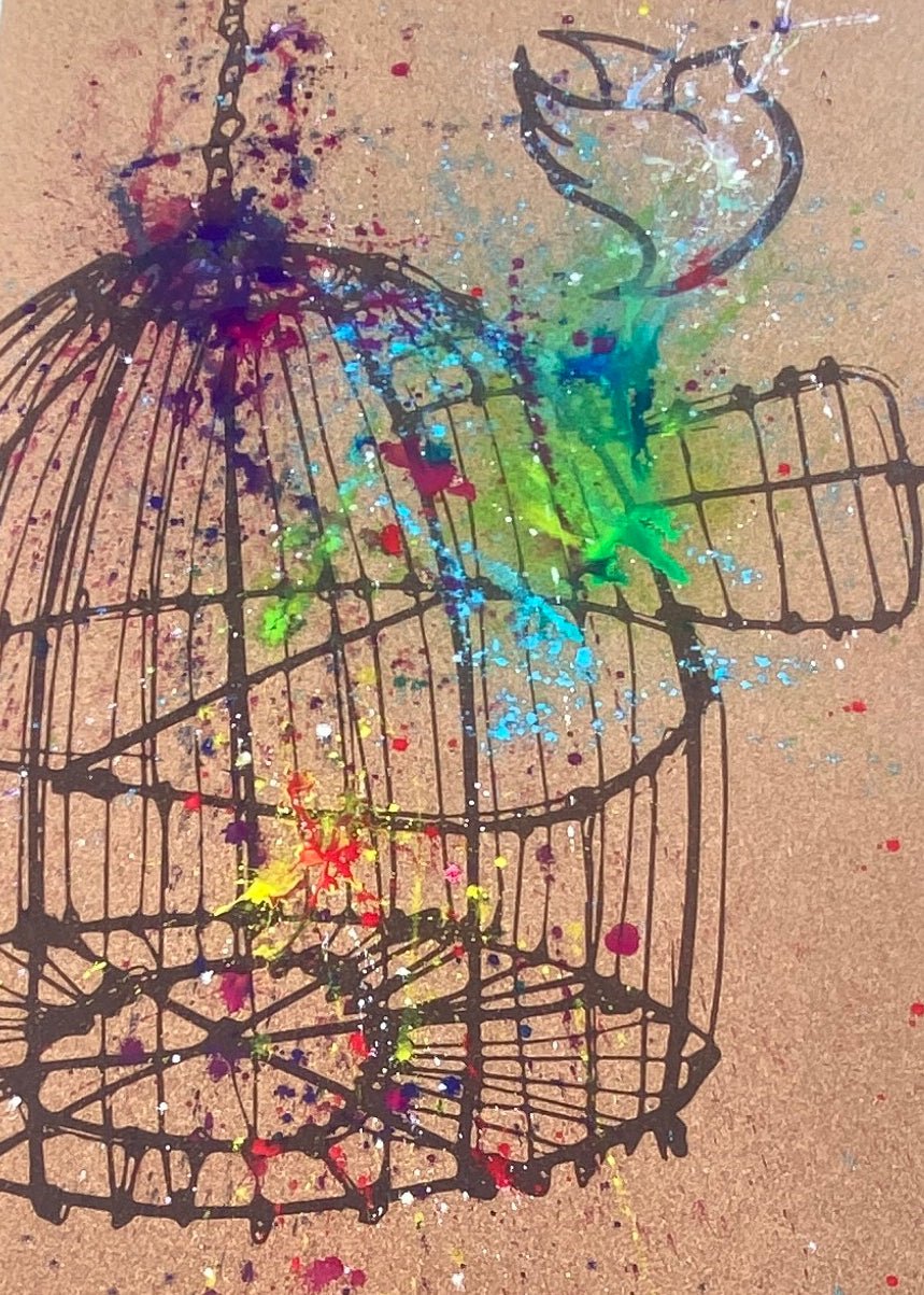 Cork travel yoga mat detail with a hand-painted birdcage and rainbow splashes