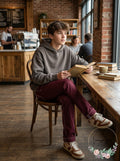 Burgundy slim stretch canvas pants with zip fly, belt loops, and front pockets