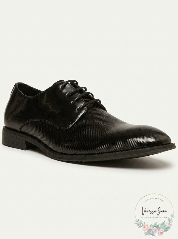 Black embossed patent derby shoes, lace-up front view with textured toe.