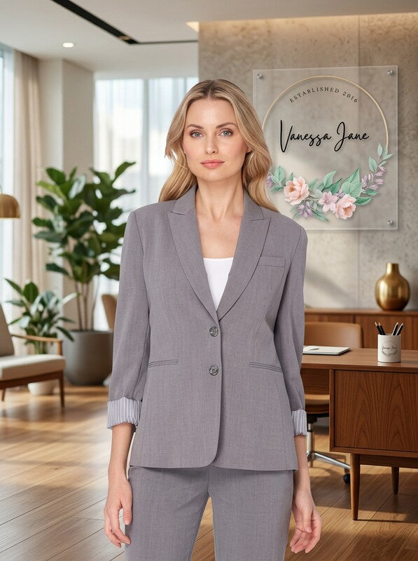 Heather gray two-button peak-collar blazer with front welt pockets and long sleeves