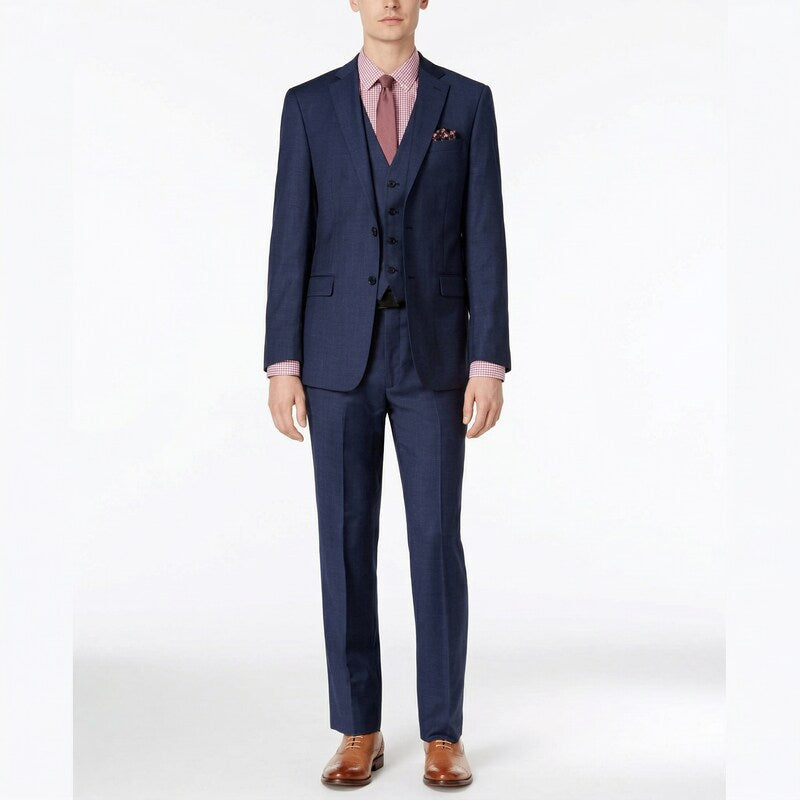 Men's blue extra-slim 3-piece suit with vest, pink shirt, and brown leather shoes