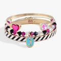Gold tone bracelet set of 3 with heart, cat, and ballerina charms