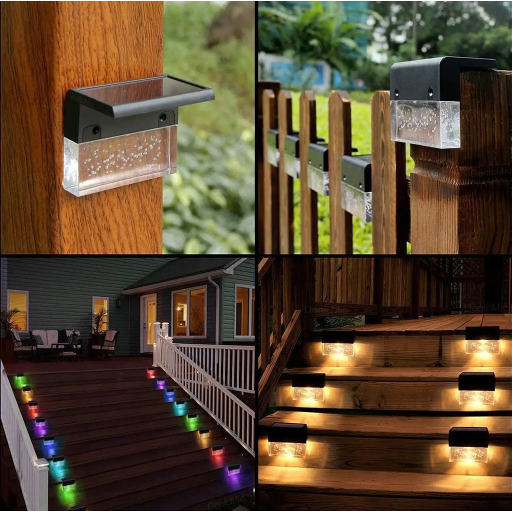 Set of black solar fence step lights with glowing multicolor RGB LEDs on fence