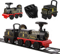 Black and red electric toy locomotive with smokestack and number 8 detail on track