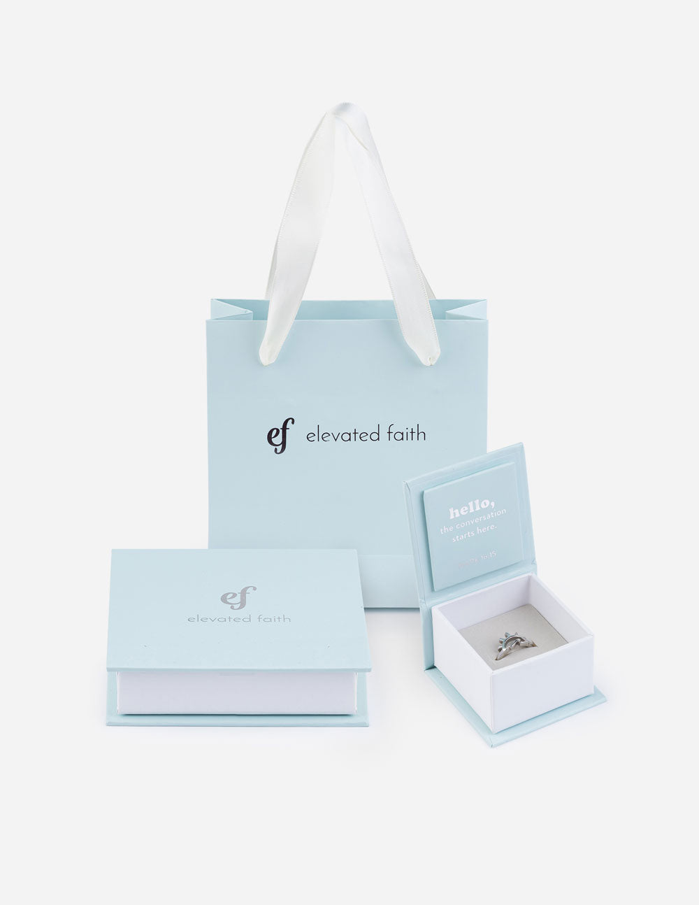 Light blue gift bag with matching ring box set and open display tray