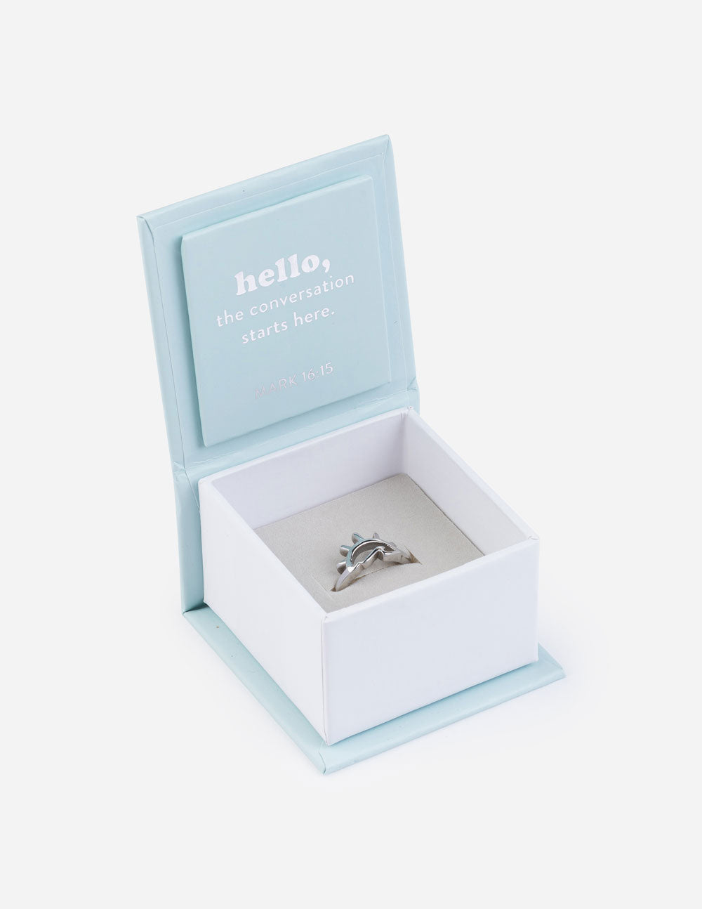 Light blue open ring presentation box with silver ring on white cushion