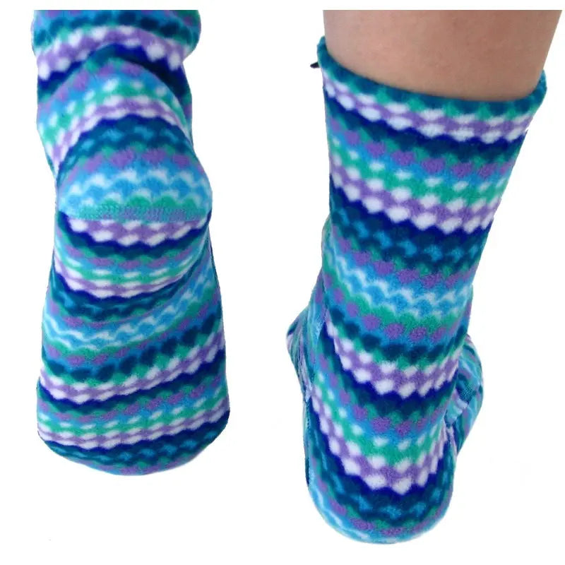 Kids' fleece socks close-up: teal, purple, and white ripple stripes on cuffs.