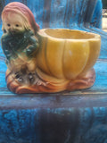 Vintage yellow ceramic gnome pumpkin planter with open bowl and seated figure