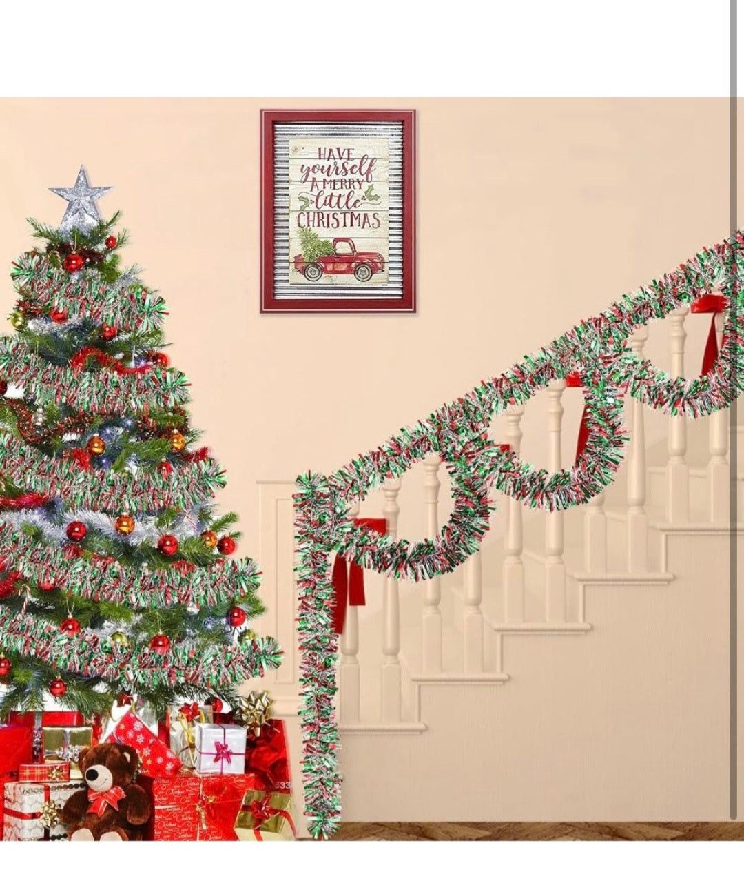 Red, green, and silver metallic garland draped across a fireplace