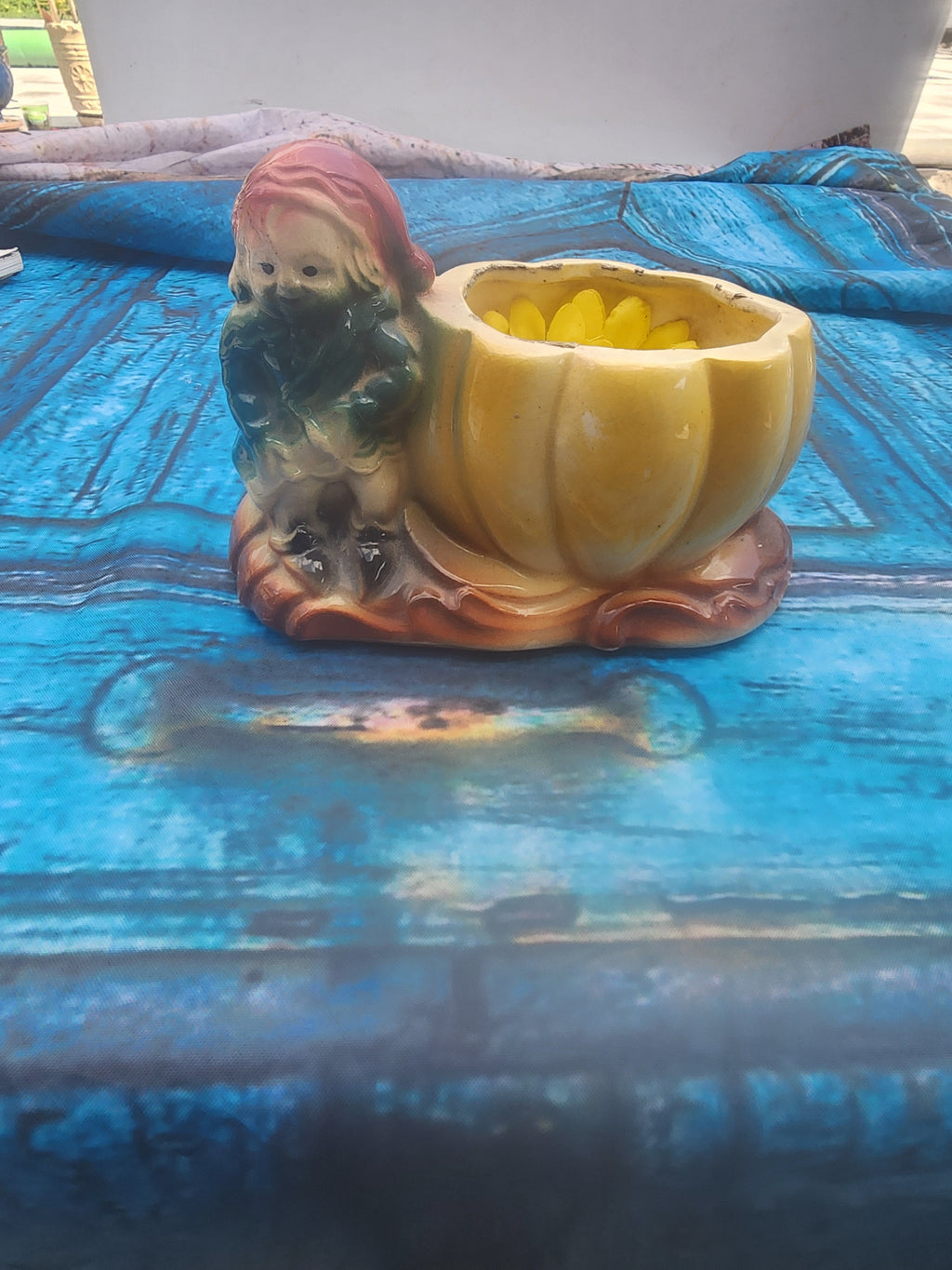 Vintage ceramic gnome pumpkin planter with yellow bowl and seated gnome, full view