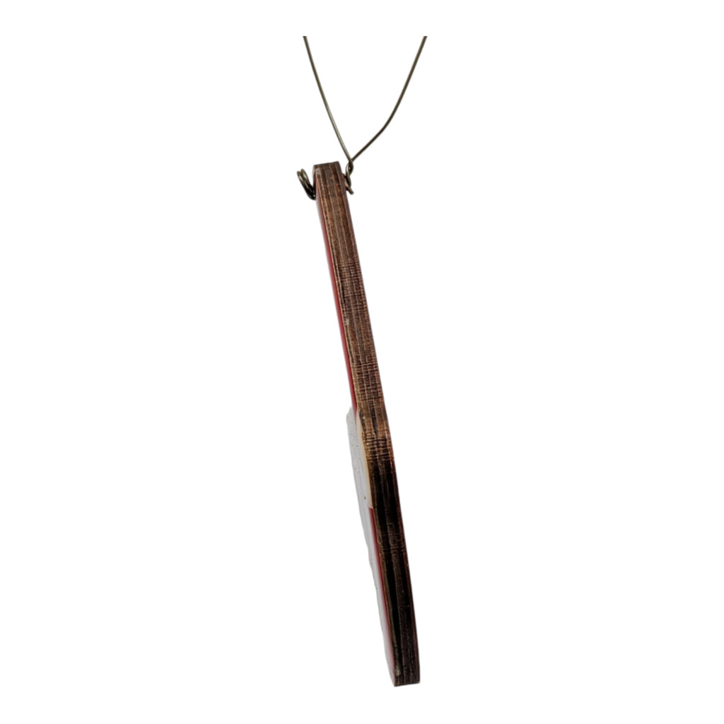 Santa dome ornament with hanging loop, textured red-and-gold side view