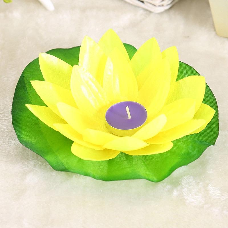 Yellow and green lotus-shaped floating LED candle with purple center light