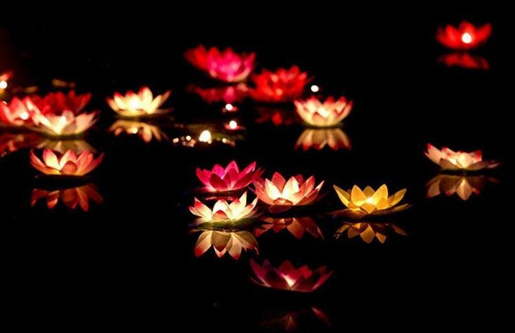 LED lotus floating candle set with multiple glowing lotus petals and reflections