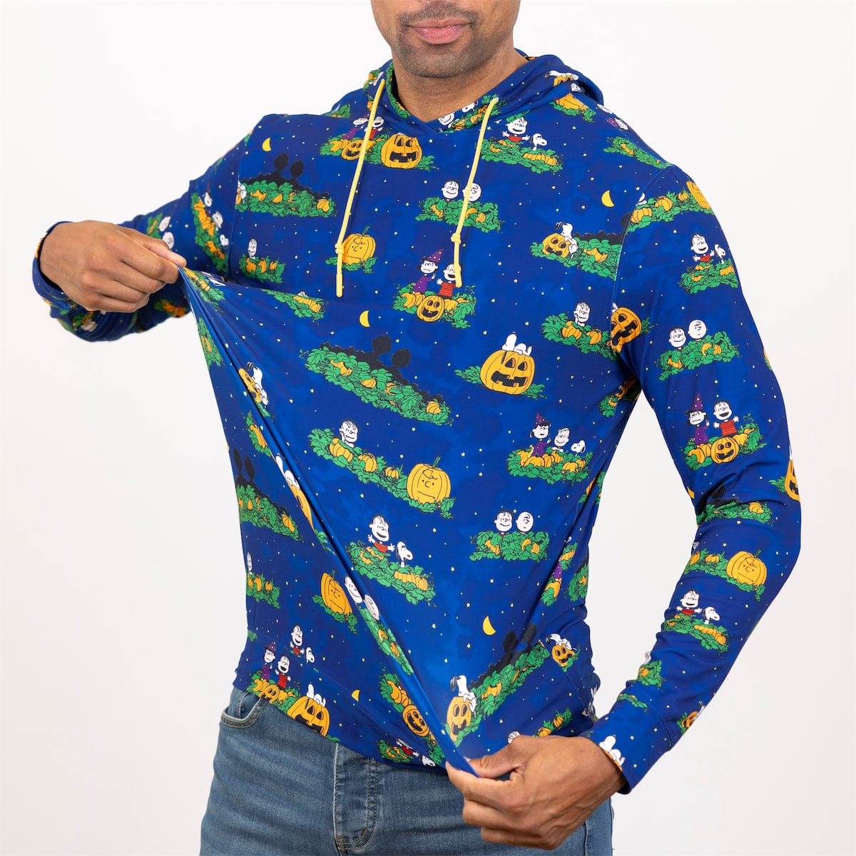 Blue Peanuts Halloween performance hoodie on model, side pose showing long sleeves