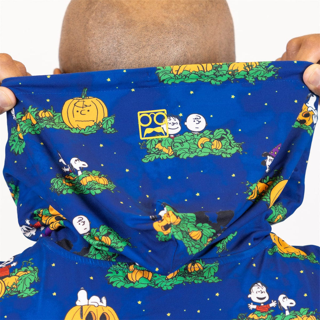 Blue Peanuts Halloween hoodie fabric close-up with pumpkin characters and green vines