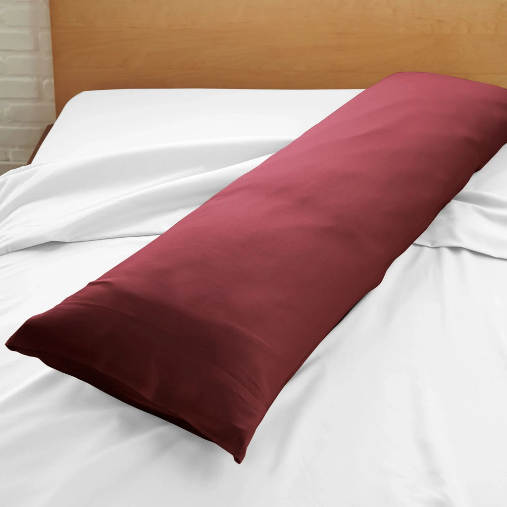 Ruby red body pillowcase close-up on bed