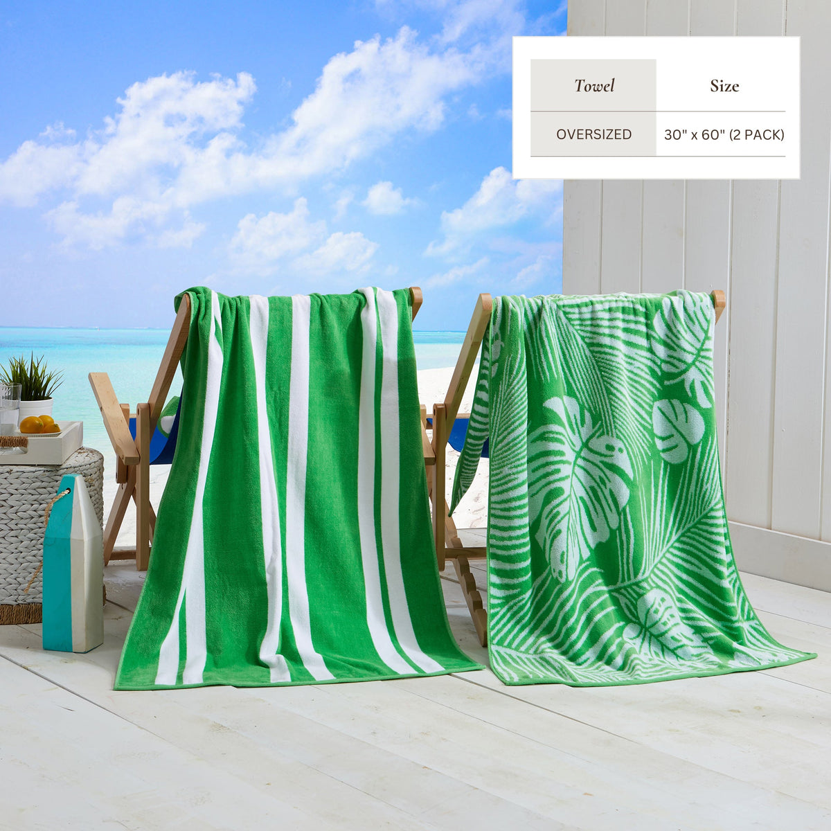 Green cotton velour towels on chairs, one striped and one with leaf motif