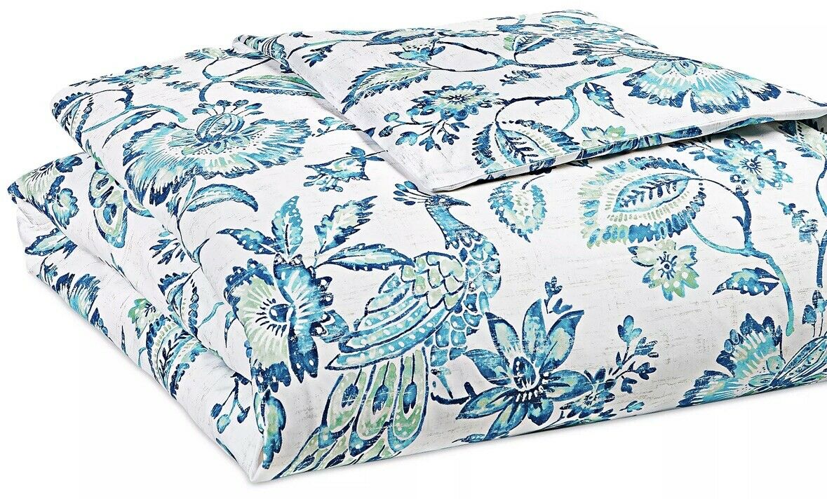 Cotton duvet cover, folded flat, white with teal-blue peacock and floral print