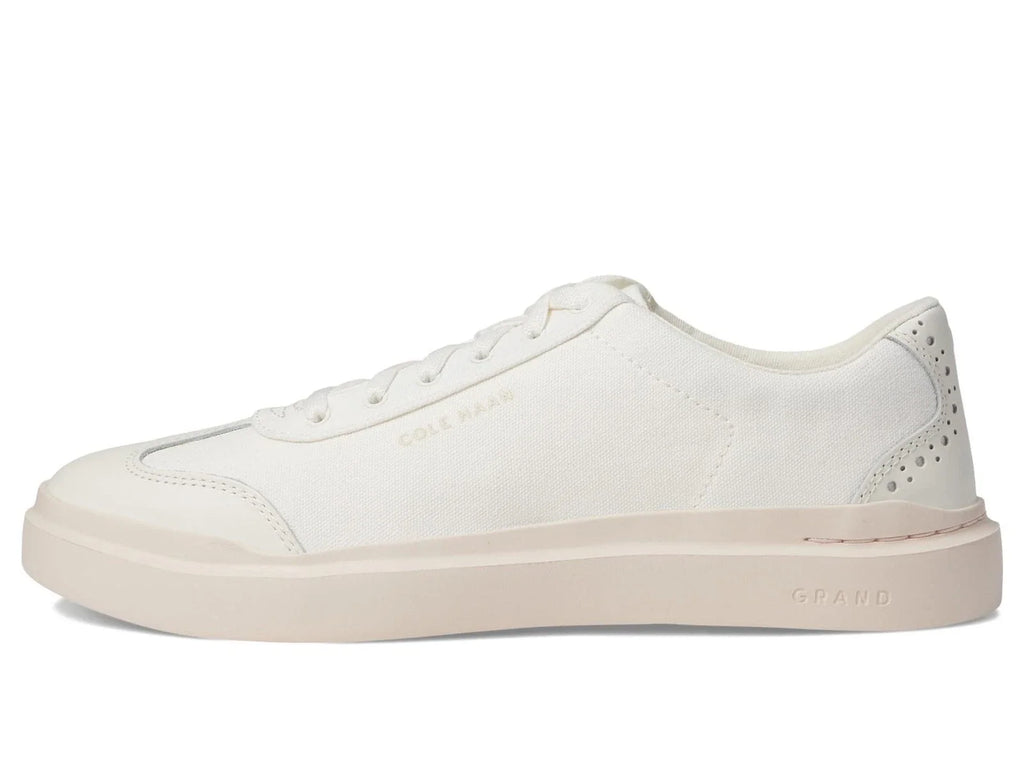 Women's Cole Haan GrandPro Rally T-Toe sneakers, side view with perforated toe and laces