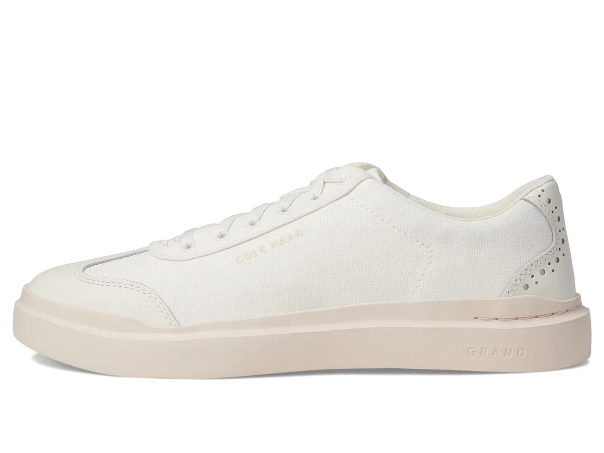 Women's Cole Haan GrandPro Rally T-Toe sneakers, side view with perforated toe and laces