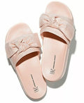 Women's knotted slide slippers in blush pink, cushioned footbed and thong strap