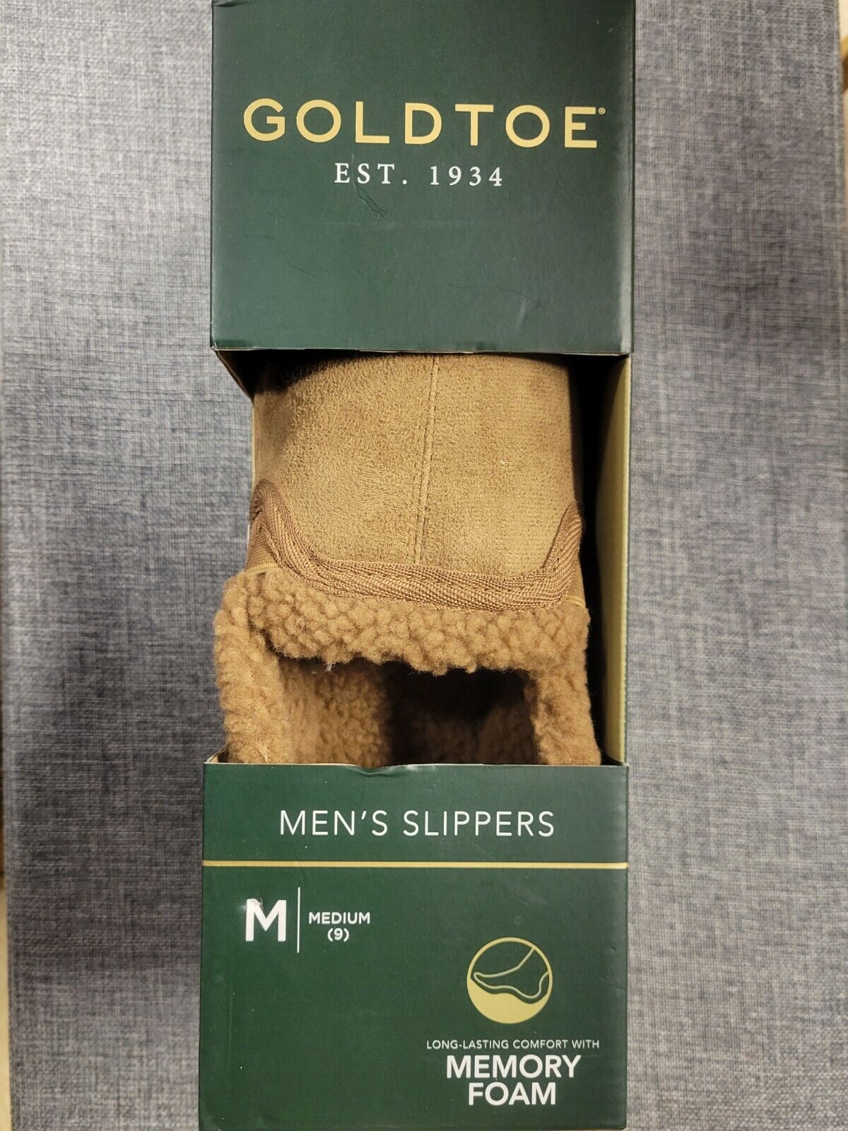 Men's tan faux fur slip-on slippers in retail box