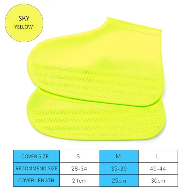 Yellow silicone shoe cover boots with chevron tread, pair stacked
