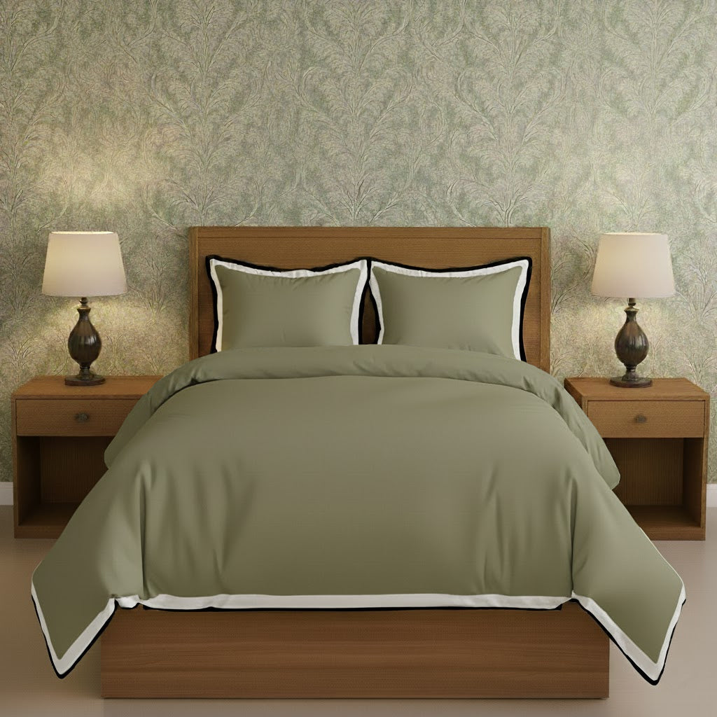 Sage green duvet cover set with white border frame and matching pillow shams