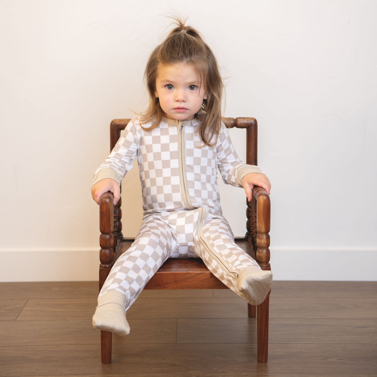Checkered hooded infant zippy suit with front zipper; beige and white