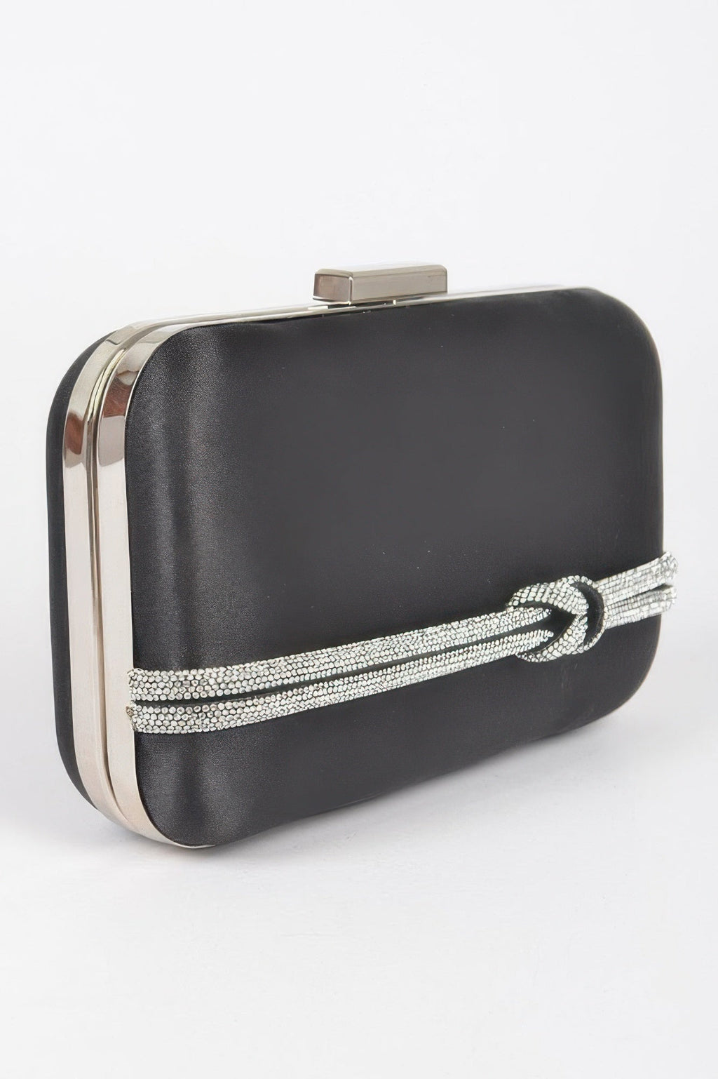 Black satin frame clutch with gold-toned metal edges and rhinestone handle